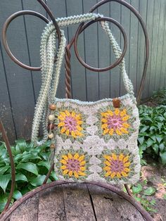 Handmade crocheted 9"square crossbody bag Handmade Square Crochet Bag For Spring, Spring Crochet Bag With Adjustable Strap, Brown Crochet Bag With Granny Square Design, Casual Rectangular Crochet Bag With Adjustable Strap, Casual Crochet Bag With Adjustable Strap, Spring Square Crochet Bag, Travel Crochet Crossbody Shoulder Bag, Crochet Crossbody Shoulder Bag For Travel, Brown Rectangular Crochet Bag With Granny Square