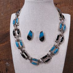 "Fantastic vintage Mexico necklace and earring set! 925 silver with turquoise and black onyx in a cool linked design. Back of the necklace is marked \"Mexico / 925 / TS-108\" back of one of the earrings is marked \"925 / TO-86 / Mexico\". Necklace measures about 18\" long - pierced earrings are about 1\" long. Weight of the necklace is around 100.90 grams. In wonderful vintage condition with some age patina that could be polished off if desired." Southwestern Black Sterling Silver Jewelry, Black Sterling Silver Jewelry With Inlay, Mexico Necklace, Turquoise And Black, Vintage Mexico, Black Onyx Necklace, Onyx Necklace, Necklace And Earring Set, Jewelry Boho