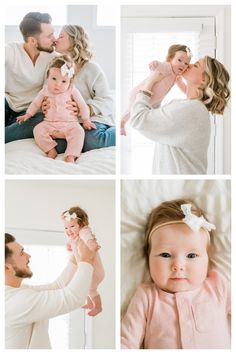 a man and woman are holding their baby girl while she holds her up to the camera