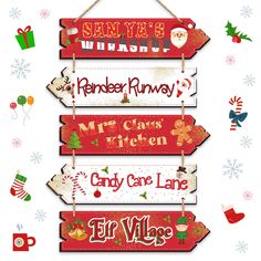 wooden christmas signs hanging on a wall