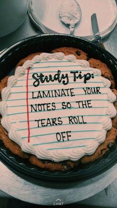 a cake with writing on it that says study trip laminate your notes so the tears roll off