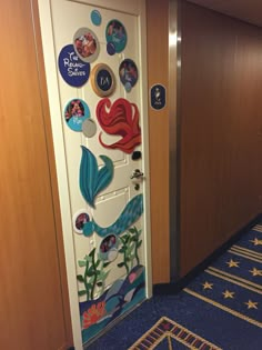 the door is decorated with disney's little mermaid stickers