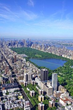 an aerial view of new york city from the top of the empire building, looking down on central park