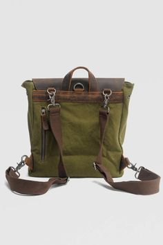 Retro Backpack Leather Portable canvas bag – rrdeye Green Canvas Backpack Shoulder Bag, Canvas Shoulder Bag For Daily Use, Rectangular School Satchel With Canvas Lining, Large Capacity Green Canvas Backpack, Canvas Backpack With Pockets For Daily Use, Vintage Green Backpack For Everyday Use, Green Satchel Backpack With Zipper Pocket, Green Satchel Backpack With Pockets, Green Canvas Satchel For School