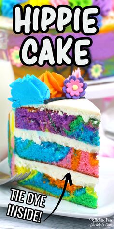 a slice of rainbow cake on a white plate with the words hippie cake above it