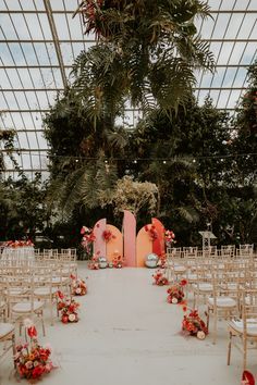 bright 70's styled wedding aisle with disco balls and colourful floral displays Wedding Arches Backdrop, 70s Wedding Backdrop, Simple Colourful Wedding Decor, Flowers With Disco Balls, Disco Ball Wedding Altar, Sefton Palm House Wedding, Mexican Disco Wedding, Gold And Colorful Wedding, Disco Ball Wedding Ceremony Decor