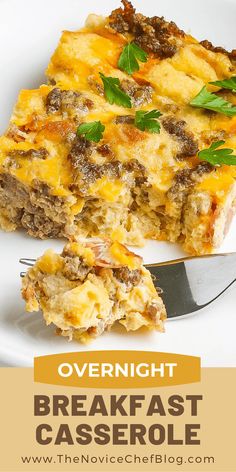 a slice of overnight breakfast casserole on a plate with a knife and fork