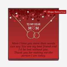 a card with two rings and hearts on it that says to my dear mom i love you more than words can say