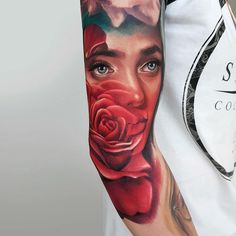 a man with a rose tattoo on his arm