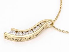 Lisa Mason for Bella Luce® white diamond simulant 1.79ctw round, Eterno™ 18k yellow gold over sterling silver "The Road Less Traveled" pendant with chain. Pendant measures approximately 1" L x 0.25" W and has a 3mm bail. Includes a 18" L x 0.03" W cable chain that has a 2" extender and lobster claw clasp closure. The diamond equivalent weight is 1.08ctw. Personalized Moissanite Jewelry For Anniversary, Yellow Gold Jewelry With Prong Setting For Mother's Day, Gold Moissanite Channel Set Jewelry, Anniversary Channel Set Cubic Zirconia Necklace, Channel Set Cubic Zirconia Anniversary Necklaces, Anniversary Cubic Zirconia Channel Set Necklace, Yellow Gold Moissanite Jewelry With Channel Set, The Road Less Traveled, Road Less Traveled