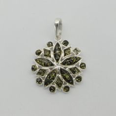 These is a beautiful Sterling Silver Pendant with Amber. The pendant is made out of solid 925 Silver and there is no nickel or other substances causing most allergies. This makes the pendant hypo allergenic. Size of the Pendant in total - with the bail 4.0 x 2.9 cm or  1.57 x 1.14 inch You will receive the item in a gift box - perfect to surprise someone or yourself. Usually we ship on the same day we receive the payment for the order. We want you to be happy with your purchase. If you do not li Julie Williams, Star Circle, Round Star, Amber Heart, Amber Ring, Circle Pendant, Fun Earrings, Baltic Amber, Sterling Silver Pendants