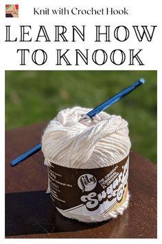 a crochet hook with yarn in it and the words learn how to knit