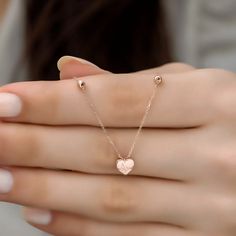 Crafted from high-quality sterling silver, this necklace is both stylish and durable, making it the perfect gift for a loved one on any occasion. Metal: 925 sterling silver; Coating: 18k rose gold Necklace length: 17"(42.5cm) + 2" (5cm) chain extender Chain style: cable link Hypoallergenic: nickel-free materials used therefore suitable for those with metal allergies Rose Gold Delicate Chain Necklace For Mom, Rose Gold Necklace With Delicate Chain For Mom, Rose Gold Jewelry With Adjustable Chain For Mom, Rose Gold Dainty Necklace For Valentine's Day, Rose Gold Open Heart Charm Necklace With Delicate Chain, Dainty Rose Gold Necklace For Valentine's Day, Rose Gold Fine Jewelry Necklace For Mom, Rose Gold Heart Pendant Charm Necklace, Rose Gold 14k Gold Heart Necklace For Her