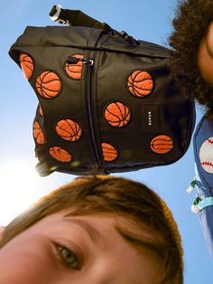 See you on the court. Perfect for weekend trips and school days, the Kane Kids Travel Backpack - Fuzzy Basketballs has all the functionality in the world (pockets, zippers, water bottle holders, padded straps!) with fun, fuzzy basketball appliques all over. 15" H x 12" W x 5" D. Recommended for ages 4-8. Kids Travel, Water Bottle Holders, Weekend Trips, The Court, School Days, Bottle Holders, Travel With Kids, Travel Backpack, Appliques