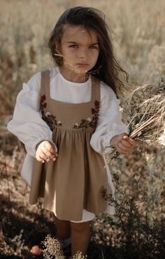 The set includes a linen cottagecore dress and an apron dress for girls. Lightweight A-line dress with puff sleeves. The apron is decorated with hand flower embroidery.             It's the perfect dress for any occasion such as a birthday party or wedding flower girl dress. If you have any questions or need more measurement please contact us. We will gladly help you. Cottagecore Prairie Dress For Garden Party, Cottagecore Beige Dress With Floral Embroidery, Cotton Cottagecore Pinafore Dress, Beige Cottagecore Prairie Dress For Garden Party, Cottagecore Cream Dress For Fall, Cream Cottagecore Dress For Fall, Cream Cottagecore Fall Dress, Pinafore Dress Toddler, Boho Dress Outfit