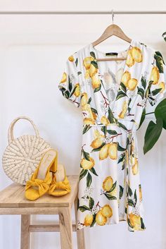 White Beach Dress With Fruit Print, White Fruit Print Dress For Beach, White Fruit Print Dress For The Beach, Summer Dress With Fruit Print For Day Out, Summer Fruit Print Dress For Day Out, White Summer Dress With Fruit Print, Summer White Dress With Fruit Print, Yellow Summer Dress With Fruit Print, Lemon Print V-neck Summer Dress