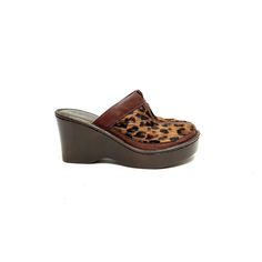 Vintage 1990s brown leather leopard print pony hair platform wedge mule clogs by Born. Features leopard print dyed pony hair uppers, brown leather trim, rounded toe, slip on mule style, thick platform, and chunky wedge heel. Excellent vintage condition.   Heel to toe (inside shoe): 9.375 inches  Ball of foot (bottom of sole): 3.5 inches  Heel height: 3.25 inches  Size 7 Retro Brown Closed Toe Mules, Brown Platform Wedge Heel Mules, Retro Brown Slip-on Mules, Brown Retro Slip-on Mules, Brown Leather Wedge Heel Mules, Vintage Brown Mules With Leather Footbed, Retro Brown Mules With Round Toe, Brown Clogs With Leather Sole And Wedge Heel, Brown Mules With Leather Footbed And Wedge Heel