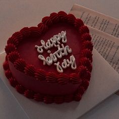 a heart shaped cake with the words happy mother's day written on it