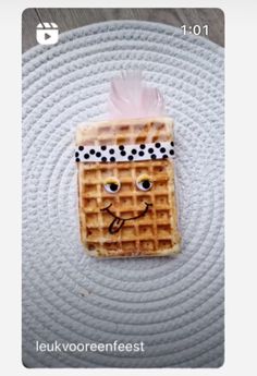 a waffle with a face drawn on it