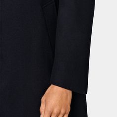 A sleek, minimalist design for a clean
  winter layer, this navy Valencia fit coat features a hidden placket, high-cut
  closure and small noth lapel for a stylishly up-to-date piece that doesn't
  lose traditional elegance. Classic Outerwear For Work, Classic Navy Outerwear With Concealed Placket, Tailored Solid Outerwear With Pressed Crease, Winter Business Casual Outerwear With Pressed Crease, Timeless Structured Business Outerwear, Navy Outerwear With Notch Lapel And Concealed Placket, Classic Winter Outerwear With Pressed Crease, Sleek Fall Outerwear With Welt Pockets, Sleek Outerwear With Welt Pockets For Fall