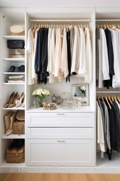 an organized closet with clothes and shoes