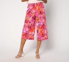 Summer's coming. Is your wardrobe ready yet? Set yourself up for the season ahead with these pretty printed capri pants. The wide-leg silhouette is ultra-flattering, and the floral pattern pops, bringing polished refinement to the forefront of your personal style. From Isaac Mizrahi Live!TM. Summer Capri Length Wide Leg Pants, Summer Capri Length Wide Leg Pants With Elastic Waistband, Relaxed Fit Wide-leg Spring Capris, Spring Wide-leg Relaxed Fit Capris, Spring Capri Pants With Loosely Fitted Hips, Wide Leg Capris For Spring Day Out, Spring Wide Leg Capris For Day Out, Summer Capri Length Bottoms For Day Out, Capri Length Bottoms For Summer Day Out