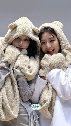 two young women are dressed in animal costumes