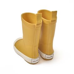 Perfect for rainy day adventures, these Toddler Rain Boots are designed in waterproof rubber. Discover thoughtful details like the extended twill finger loop for easy on-and-offs and the embossed heel. With slip resistant soles, the Rain Boot comes in three colors to Pehr with the Park Jacket, the perfect Rainwear for the coming season. Click "Find Your Size" for our Printable size chart to get the perfect fit! 100% Natural Rubber BPA Free Runs small: We recommend sizing up 2 sizes for most comf Toddler Rain Boots, Free Runs, Rain Boot, Free Running, Baby Carrier, Rain Wear, The Rain, Rainy Day, The Park