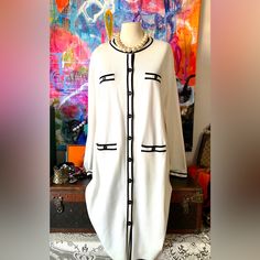 Gorgeous Classic Wardrobe Piece. Karl Lagerfeld . Looks Like Chanel. Ladies Size L. Button Frontthey Wear The Logo. Faux Pockets At The Chest.Lower Ones Function. Love The Length! Would Be Fabulous Belted. Pearls Stay With Me. Measurements Avail. Will Say It’s 39” Long. Absolutely Beautiful Follow Along On Ig @Laughincolorstudio For Styling, Luxury And Original Art Classic White Winter Dress, Classic White Dress For Winter, Classic White Dresses For Winter, Karl Lagerfeld Sweater, Classic Wardrobe Pieces, Long Black Sweater, Stay With Me, Long Sweater Dress, Classic Wardrobe