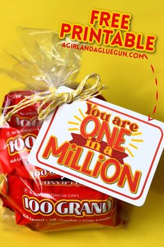 a bag of candy with the tag you are one million on it and an ad for free printable