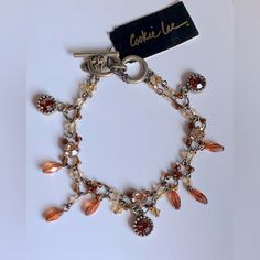 Genuine Crystal Antique Gold Tone Adjustable Double Stranded Beaded Dangle Toggle Bracelet By Cookie Lee * Nwt * Amber, Orange Tones * Rhodium Plated * Adjustable Toggle * Open Length: 8” Bundle & Save On Shipping And The More You Treat Yourself The Bigger The Discount You Will Receive! Ask Me Any Questions. I Want You To Be 100% Satisfied! Packaged With Care Just For You Fast Shipping Thank You For Visiting My Closet. Please Come Back Again Soon. Elegant Orange Metal Bracelets, Elegant Orange Metal Bracelet, Vintage Beaded Bracelets For Jewelry Making, Amber Beaded Bracelets, Adjustable Orange Beaded Bracelet With Lobster Clasp, Orange Beaded Bracelets, Travel Charm Bracelet, Cookie Lee Jewelry, Holiday Bracelets