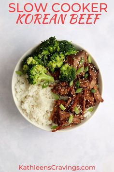 a bowl filled with meat and broccoli on top of rice