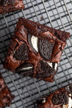 chocolate brownies with oreo cookies and cream filling on a cooling rack, ready to be eaten