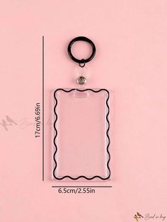 a clear square shaped keychain with a black rubber ring on the front and bottom