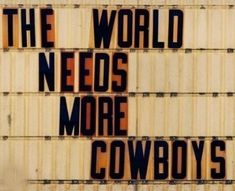 the words are written in black and orange on a white background that says, the world needs more cowboys