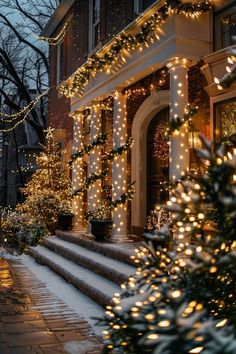 christmas lights decorate the front steps of a house