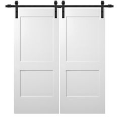 two white doors with black hardware on each side