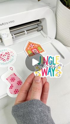 someone is using a sewing machine to make stickers