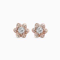 ✥ Add a touch of elegance to your ensemble with these stunning Round Cut Unique Flower Style Moissanite Diamond Studs Earrings. Crafted with precision, these earrings feature a mesmerizing floral design that is both timeless and unique. The round cut Moissanite diamonds sparkle with brilliance, creating a captivating display of light. Perfect for any occasion, these earrings are a must-have accessory for those who appreciate exquisite craftsmanship and sophisticated style. Upgrade your jewelry c Elegant Round Cut Moissanite Diamond Earrings, Round Brilliant Cut Moissanite Diamond Earrings, Brilliant Cut Moissanite Round Earrings, Fine Moissanite Round Cut Earrings, Luxury Round Cut Rose Diamond Earrings, Diamond Studs Earrings, Diamond Earrings For Women, Stud Design, Flower Style