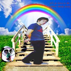 a man walking down a set of stairs with a rainbow in the sky behind him