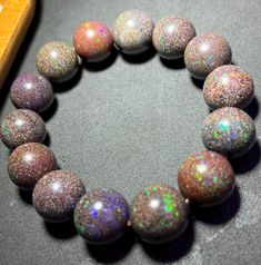 Material:Opal beads size :15mm   quantity: one strand  6mm approx 29 pcs one strands 7mm approx25 pcs one strands 8mm approx 22 pcs one strands 9mm approx 21pcs one strands 10mm approx 19 pcs one strands 11mm approx 18pcs one strands 12mm approx 16 pcs one strands 13mm approx 16 pcs one strands 14mm approx 15 pcs one strands 15mm approx 14pcs one strands 16mm approx 14 pcs one strands 17mm approx 13pcs one strands 18mm approx 13pcs one strands 19mm approx 12pcs one strands 20mm approx 12pcs one strands PLEASE NOTE: 1.Due to lighting effects, monitor's brightness/contrast settings etc, there could be some slight differences in the color tone of the pictures and the actual item. 2.Each piece of natural crystal is unique, the imperfections add natural characters to them. There might be small Iridescent 8mm Round Bead Jewelry, Iridescent Polished Round Beads Jewelry, Iridescent Jewelry With Polished Round Beads, Opal Gemstone Beads Bracelets, Opal Gemstone Bracelets, Iridescent Round Bead Bracelets, Opal Beaded Bracelets With Round Beads, Beaded Opal Bracelets, Iridescent Round Bracelets With 8mm Beads