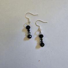 Black Ebony Silver Swarovski Bead Accent Classic Drop Dangle Earrings Black Faceted Beads Earrings For Party, Black Faceted Beads Earrings For Gift, Black Faceted Bead Earrings For Gift, Black Beaded Sterling Silver Earrings, Elegant Black Beaded Earrings With Faceted Beads, Gift Black Sterling Silver Beaded Earrings, Black Nickel-free Drop Crystal Earrings, Black Faceted Bead Drop Earrings, Black Faceted Beaded Drop Earrings