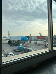 an airplane is parked at the airport terminal