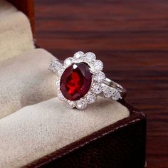 Elegant Round Cut Ruby Ring Gift, Exquisite Ruby Ring With Accent Stones For Gift, Exquisite Ruby Rings As Gift, Exquisite Ruby Rings For Gift, Elegant Crystal Ring With Birthstone For Valentine's Day, Elegant Ruby Ring For Proposal, Elegant Crystal Birthstone Ring For Valentine's Day, Elegant Red Promise Ring, Classic Ruby Diamond Ring As Gift