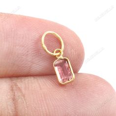 Pink Tourmaline Gold Charm, Solid 18k Gold Charm, Dainty Charm, Handmade Charm Pendant, Gemstone Charm, Birthstone Charm, Tourmaline Charm Material  Metal = 18k Gold Gemstone = Tourmaline  Stone Color = Pink Stone Size = 4X6 mm Stone Shape = Octagon Stone Creation = Natural Total Charm weight = 230 Milligram  Charm Bail Size = 4.5 mm Product Making = Handmade  Thank You Visiting My Shop. Pink Birthstone Gemstones As Gift, Rectangular Tourmaline Jewelry Gift, Rectangular Tourmaline Gemstone Jewelry, Rectangular Tourmaline Jewelry For Gifts, Pink Tourmaline Gemstone Jewelry, Dainty Tourmaline Gemstone Jewelry, Elegant Pink Tourmaline Gemstone Jewelry, Pink Tourmaline Dangle Jewelry, Tourmaline Stone