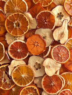 an assortment of oranges cut in half