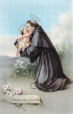 an image of a saint holding a baby