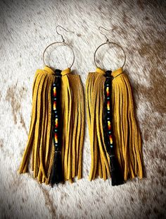 "Genuine golden deerskin fringe, black fish tail braided horsehair, double serape bead pattern, sterling silver hooks, 5\" length, soft, lightweight, durable. Message me if you would like a custom pair with your horses hair!  Cost for custom order with your horses hair add $25.  This includes all other changes of fringe, length, beads and colors. Please note, custom orders will take longer due to shipping, receiving, and customizing. Thank you!" Horse Hair Earrings, Horsehair Earrings, Hair Earrings, Black Fish, Sulphur Springs, Silver Horse, Fish Tail, Bead Pattern, Deer Skin