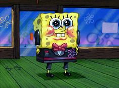 the spongebob character is holding a bow tie