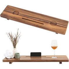 a wooden table with a wine glass on it and some other items in front of it